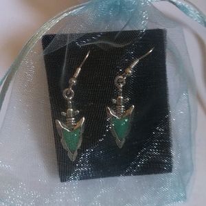 Sterling silver earrings with turquoise gem